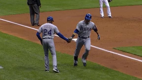 Rangers survive shaky start by Holland (10 hits)