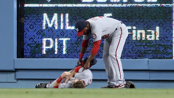 Harper leaves game after crashing into wall