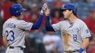 Lorenzo Ca�n peg� un imparable remolcador de 3 carreras y Billy Butler tuvo su serie de juegos m�s productiva de la temporada con un sencillo doble, los Reales de Kansas City vencieron 9-5 a los Angelinos el mi�rcoles por la noche.