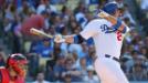 Adri�n Gonz�lez sacudi� un jonr�n e impuls� tres vueltas al irse de 3-3 y sus Dodgers vencieron 5-3 en el desquite ante los Cardenales