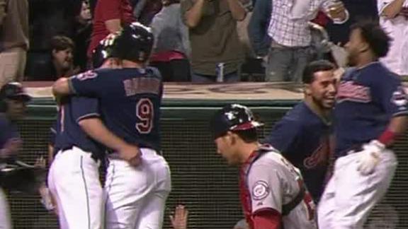 Indians beat throw home in 9th to top Nats