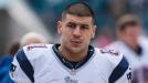 The Latest: Police Search Hernandez's Home