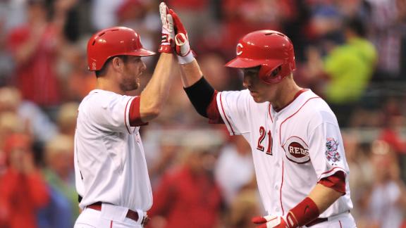 Reds pound Giants in rain-shortened game