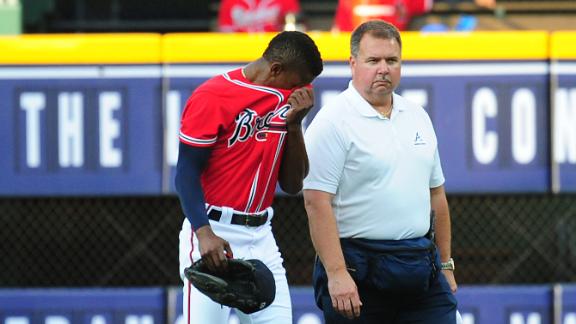 Reds' Arroyo shuts down battered Braves