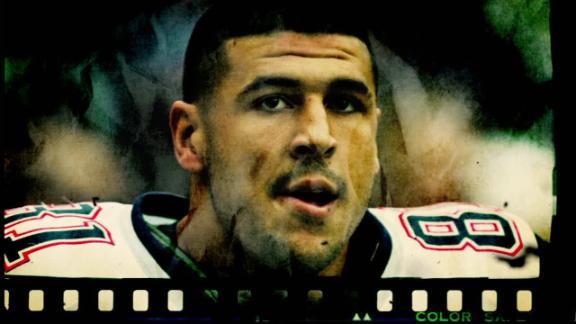 Photos: Hernandez apparently holding gun