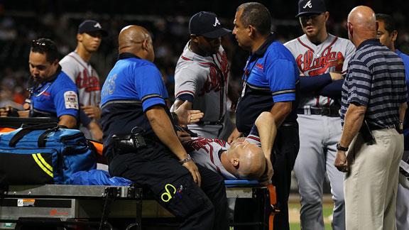 Braves' Hudson spiked in leg, carted off field