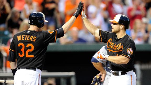McLouth's slam gets Davis, O's past Mariners