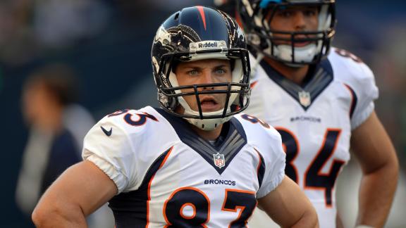 Broncos' Wolfe (neck) leaves in ambulance