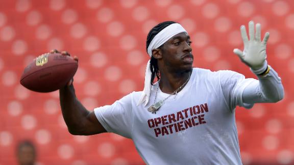 RG III jokes about apparel fine at luncheon