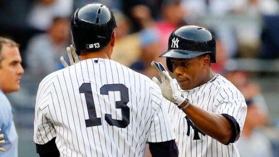 Pettitte, Yanks handle Jays after long delay