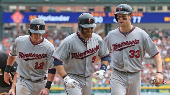 Herrmann breaks tie to help Twins by Tigers