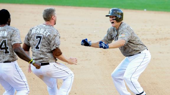 Padres top Cubs in 15th on Hundley's single