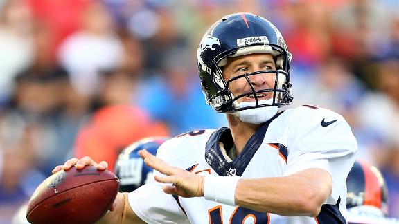 Peyton's Broncos get the best of Eli, Giants