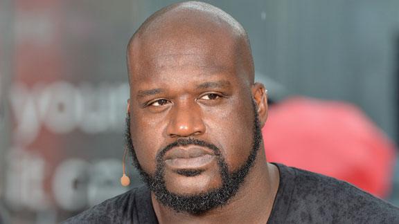 Shaquille O'Neal embraces enemy, buys part of Kings