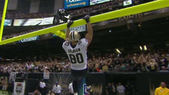 Brees tosses 4 TDs as Saints slug Dolphins