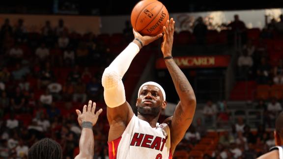 Bosh, Heat open preseason with easy win