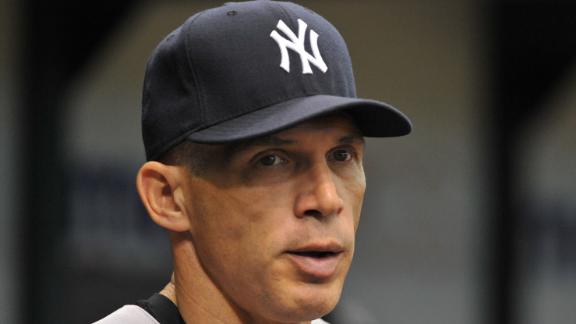 Girardi returns to Yankees on 4-year deal