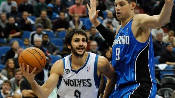 Love's 31 points, 17 boards lift Wolves in OT