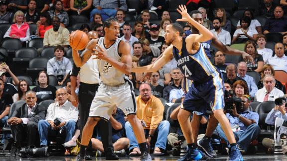Spurs win season opener; Duncan injured