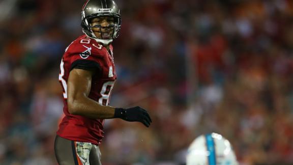 Bucs hold off Dolphins for first win of season