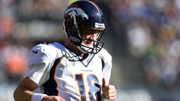 Manning back on practice field for Broncos