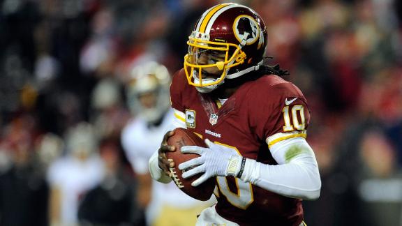 RG III defends dad being in locker room