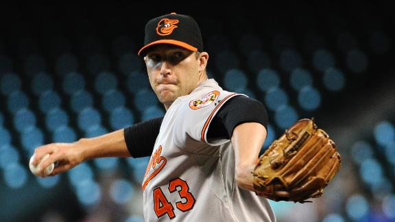 Orioles deal closer Johnson to A's for Weeks