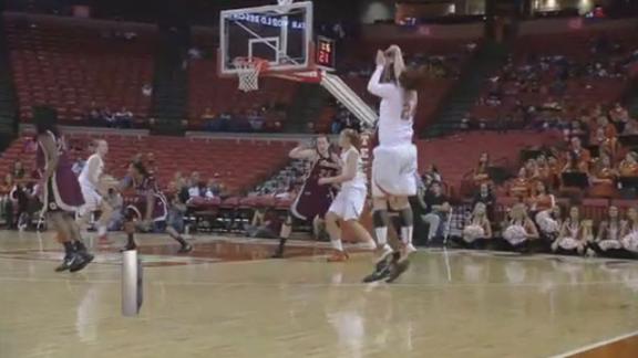 Horns Trounce Trojans 60-26
