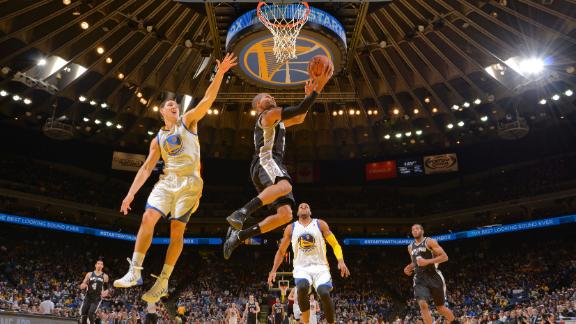 Short-handed Spurs slip past Curry, Warriors