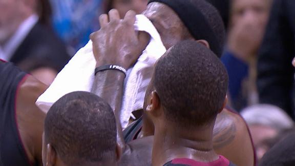 Bloodied LeBron hit on drive, set for X-rays