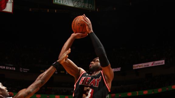 New mask, same LeBron as Heat roll Magic