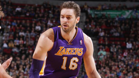 Johnson tips Blazers late as Lakers survive
