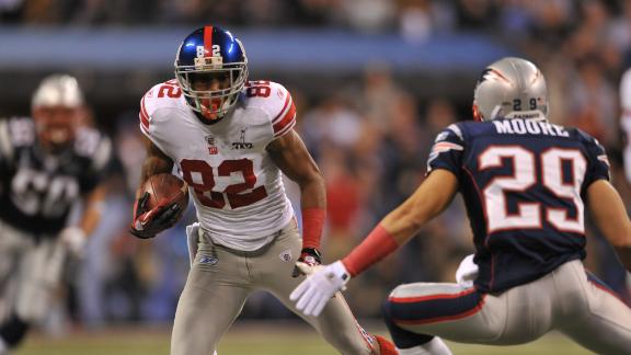 Back in blue: Manningham signs with Giants