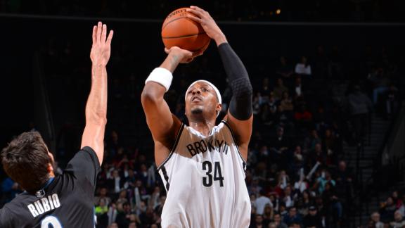 Nets win 13th straight at home, top Wolves
