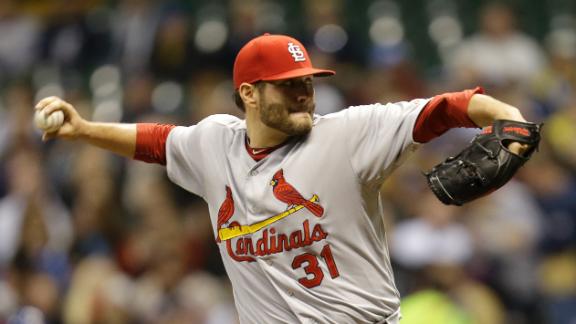 Cardinals snap Brewers' 9-game win streak
