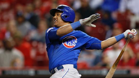 Cubs cap rally over Reds with four-run 9th