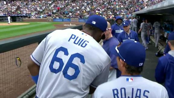 Puig exits early, day to day with hip strain