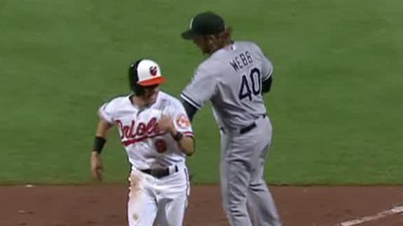 Cruz-led O's win in 12 on walk-off wild pitch