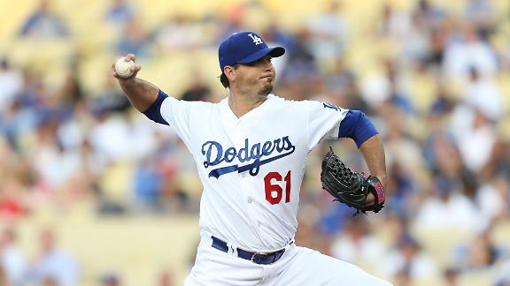 Beckett, Dodgers prevail against Wainwright