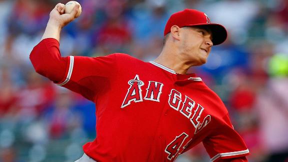 Richards wins 13th as Angels hold off Texas