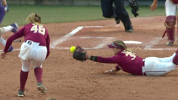 2018 Women's College World Series -- Florida State Seminoles' Jessie Warren and the diving double play that helped win Game 1 in Oklahoma City