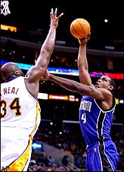 Shaquille O'Neal and Chris Webber