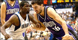The Kings' Peja Stojakovic, right, was held to 17 points.