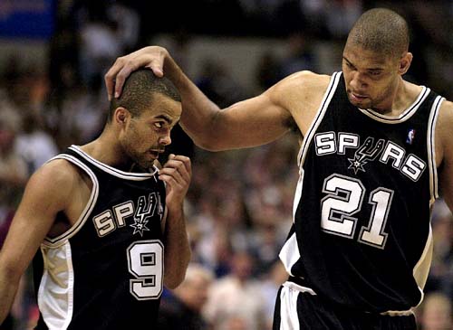 Tim Duncan congratulates Tony Parker