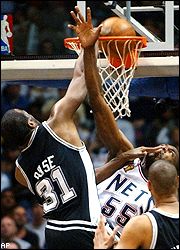 Malik Rose and Dikembe Mutombo