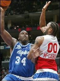 Shaquille O'Neal and Amal McCaskill