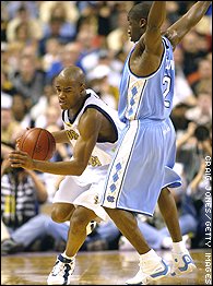 Jarrett Jack (3) and Raymond Felton