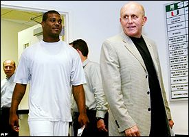 Willie Williams and Larry Coker