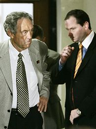 Eddie Sutton, left and Sean Sutton.