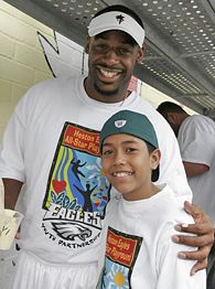 Donovan McNabb, left, and Charlie Pena